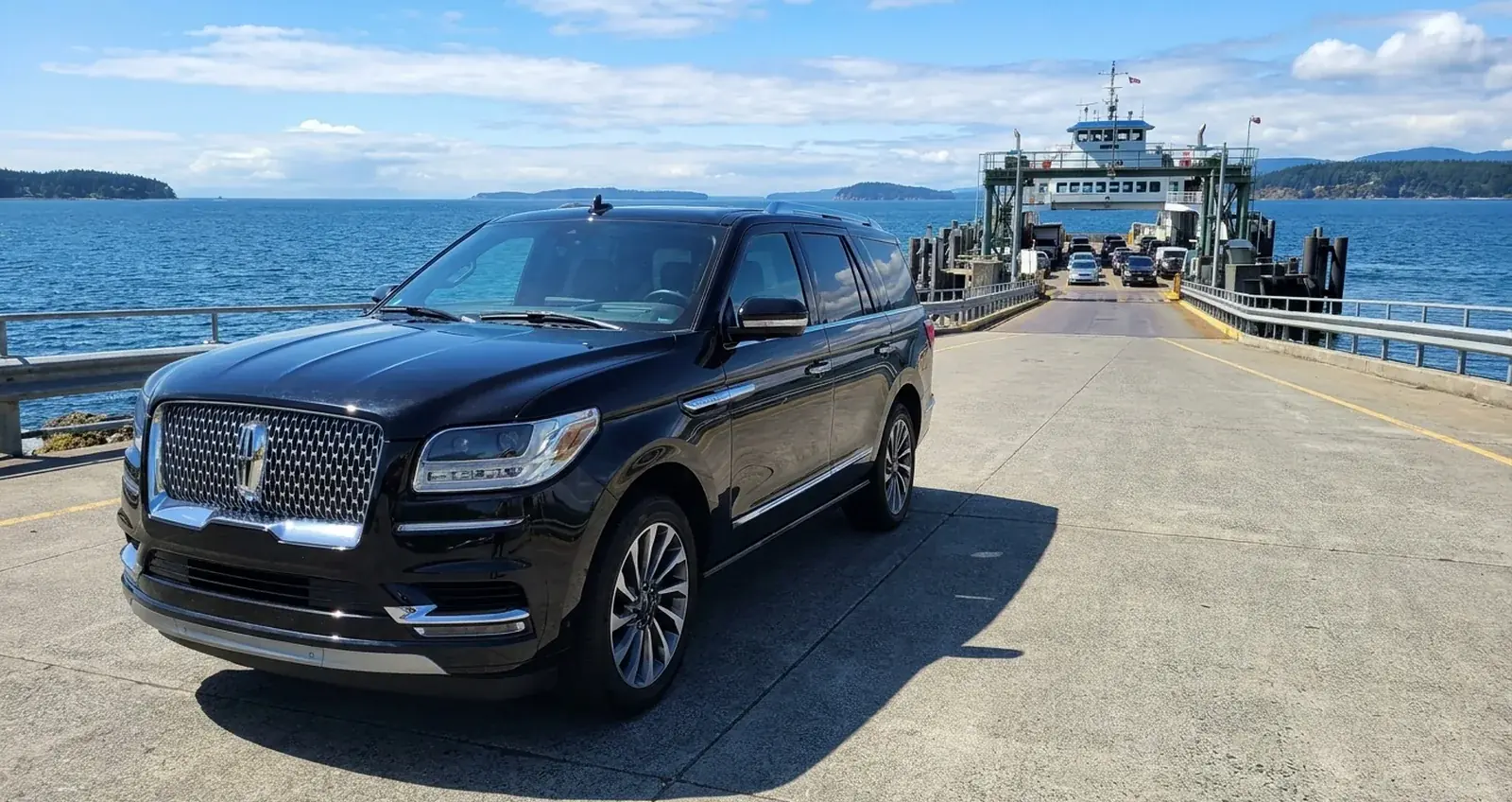 Black SUV approaching the ferry terminal